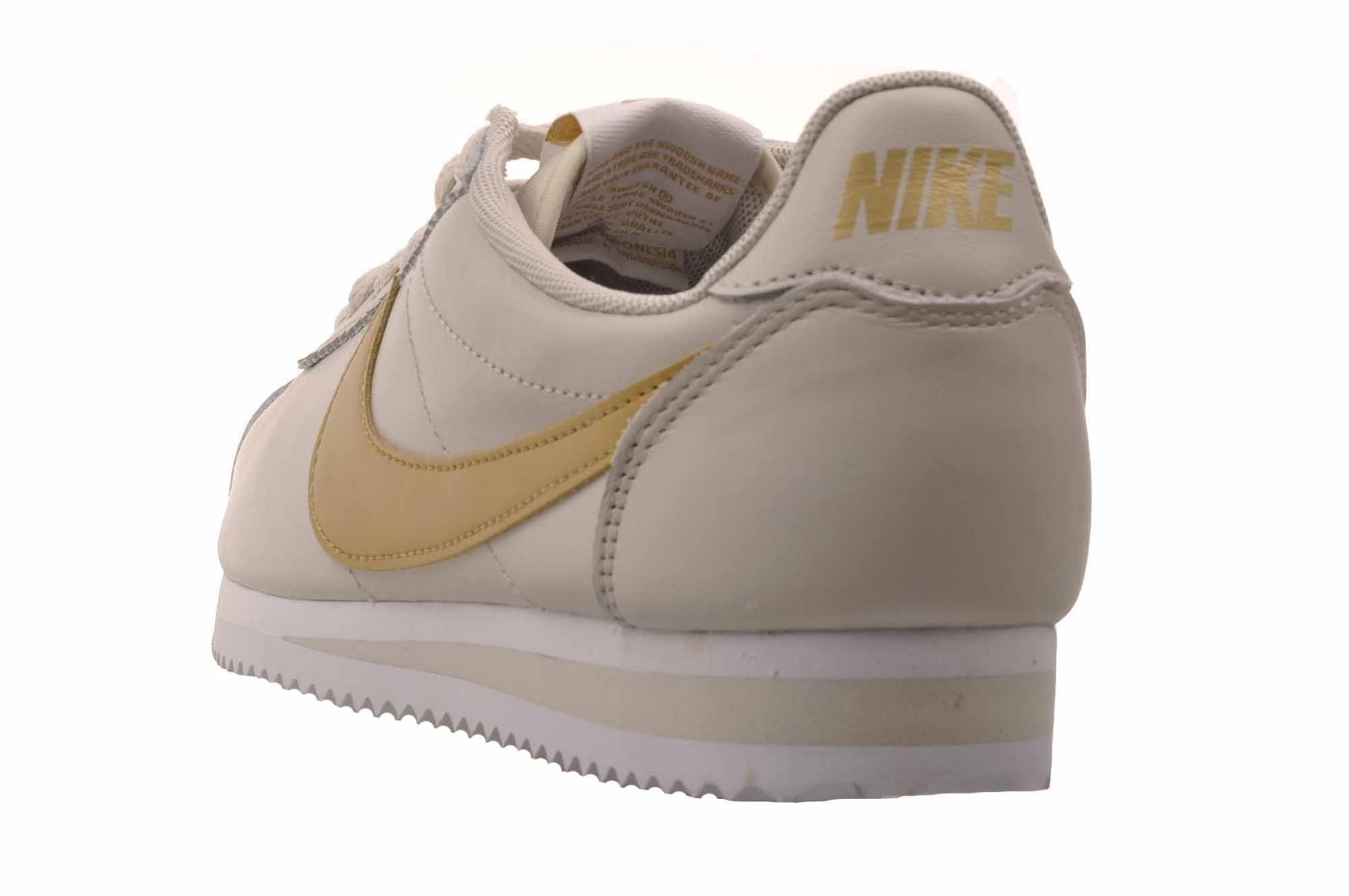 nike cortez womens white and gold