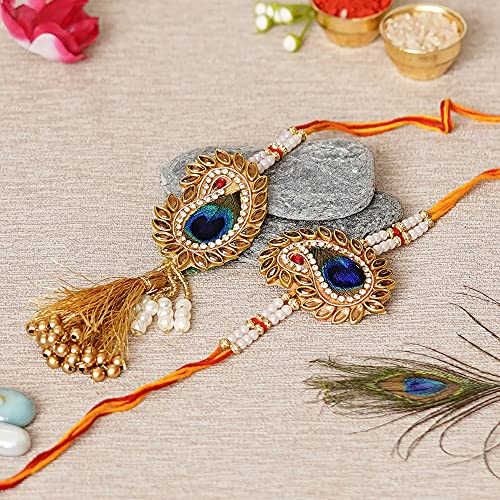 Image of eCraftIndia Peacock Feather Designer Bhaiya Bhabhi Rakhi Set with Best Bro Ever Fridge Magnet and Roli Chawal Pack