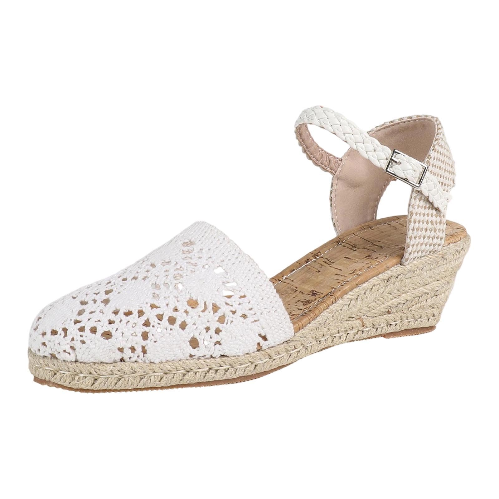 Sandalias de playa sostenibles tejidas con plataforma forrada de corcho y diseño de punta abierta. Calzado de tacón estilo alpargata a la moda.