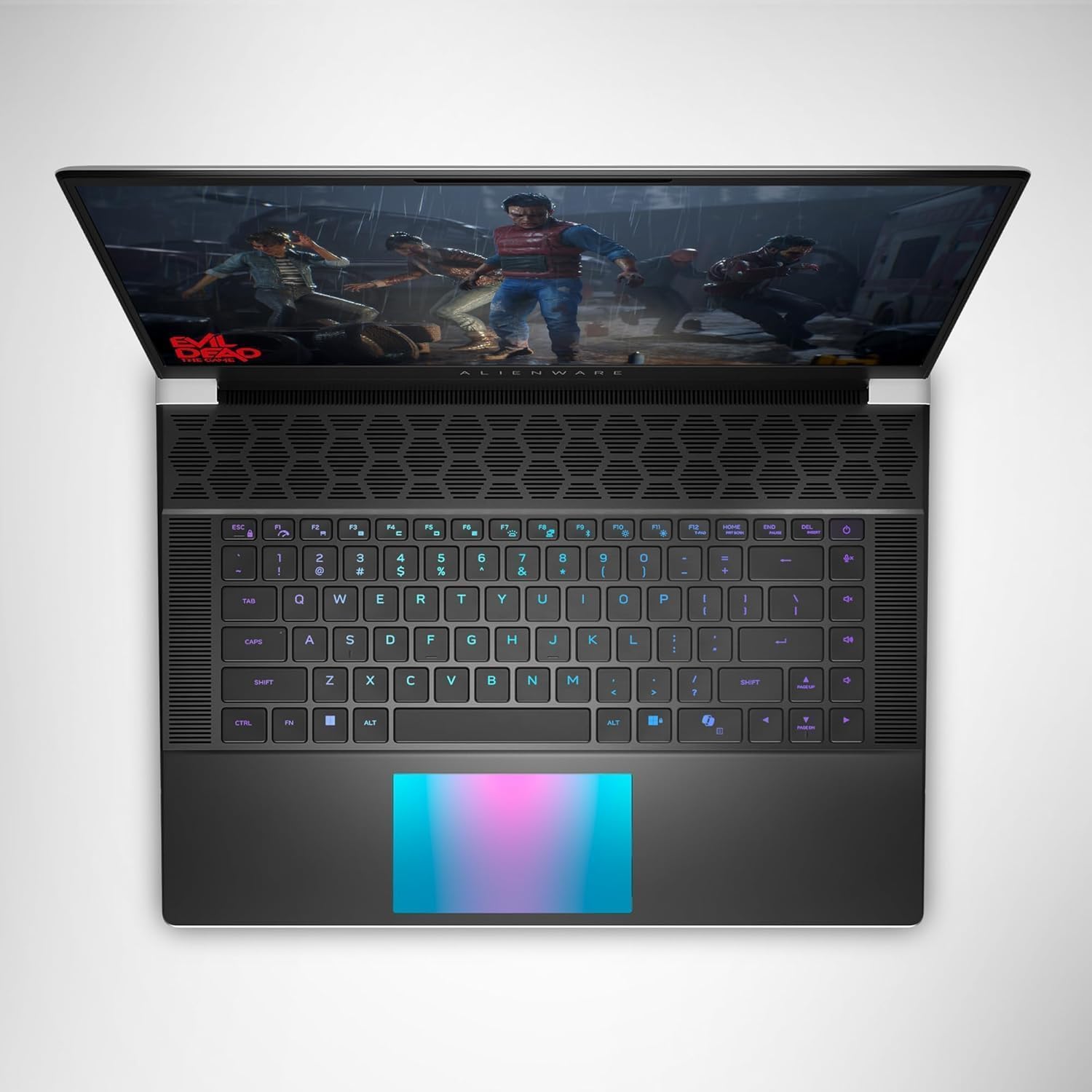 Жогорудан төмөн view of the Alienware X16 laptop, showing the RGB backlit keyboard and touchpad with a colorful gradient.