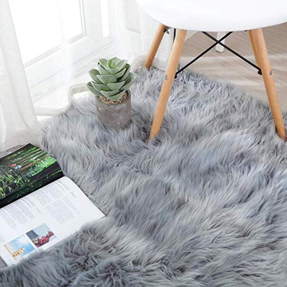 Coussin rond en peau de mouton de laine grise 100cm de haute qualité