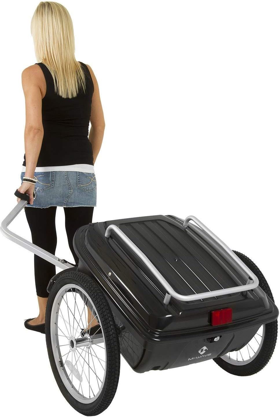 Woman pulling M-Wave Carry All trailer as a trolley