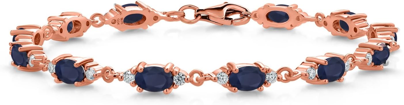 Gem Stone King 18K Rose Gold Plated Silver Blue Sapphire and White Moissanite Tennis Bracelet For Women (7.57 Cttw, Gemstone Birthstone, Oval 6X4MM, 6.5, 7, 7.5 Inch)