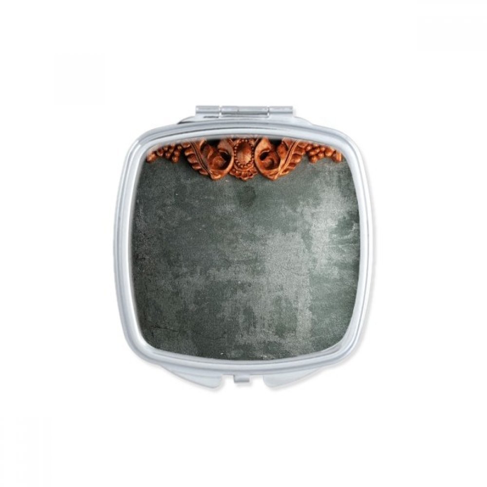 Miroir de poche motif bois acajou pour retouches maquillage en voyage