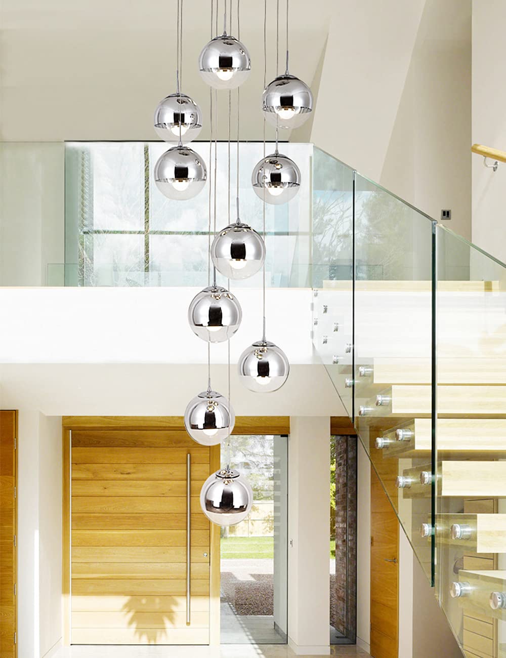 Lustre d'escalier moderne argenté avec longue suspension pour grand salon
