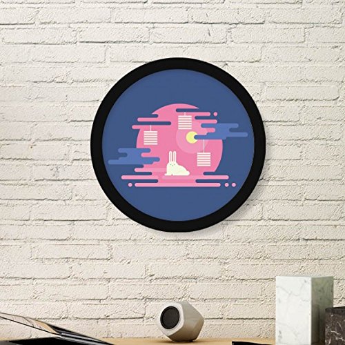 Cadre photo rond en bois noir pour briser la monotonie des murs vides