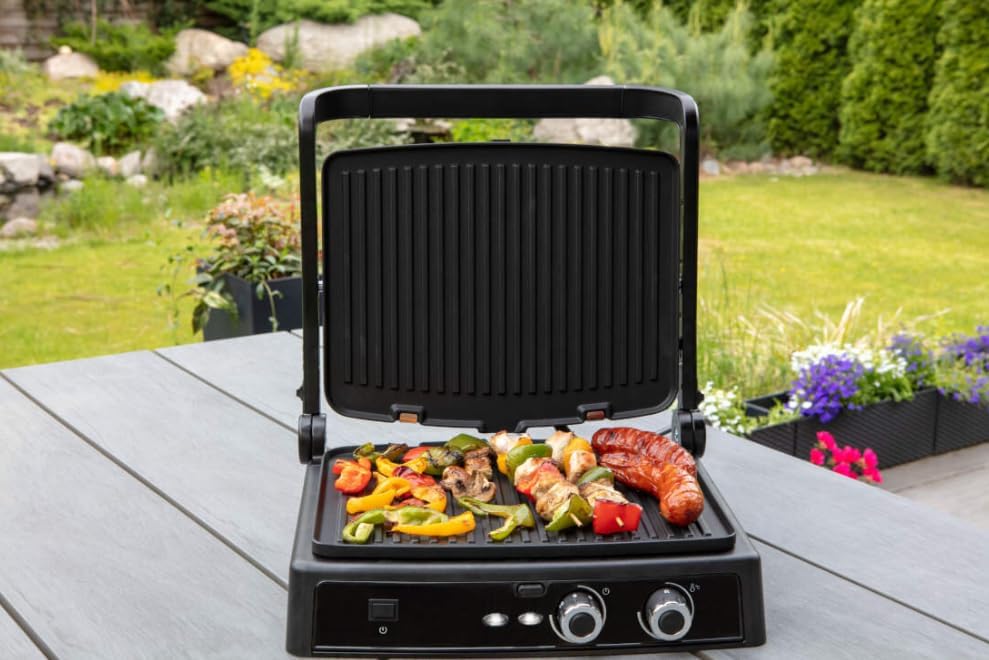 MPM MGR-12 Electric Grill in open position with food outdoors