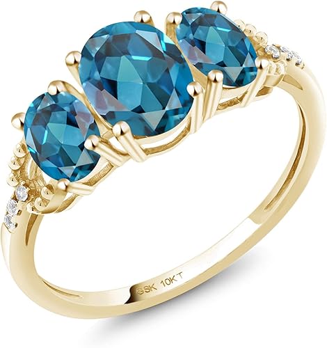 Gem Stone King Anillo de compromiso de oro amarillo de 10 quilates con topacio azul Londres y diamantes 2.22 qttw Anillo de compromiso de