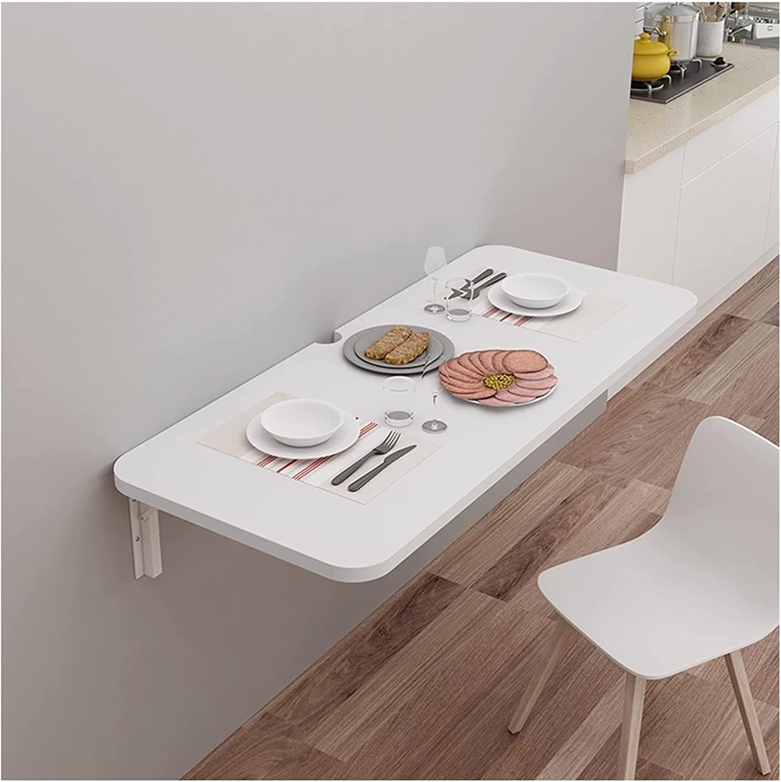 Table pliante murale avec étagère de rangement pour libérer l'espace au sol