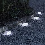 4 bloques de cristal opaco transparente con apariencia de piedra