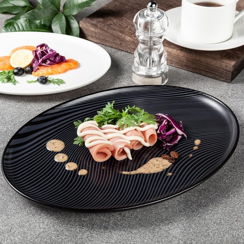 フランス レイノーリモージュ no.4花と人物の絵柄の皿 2枚セット