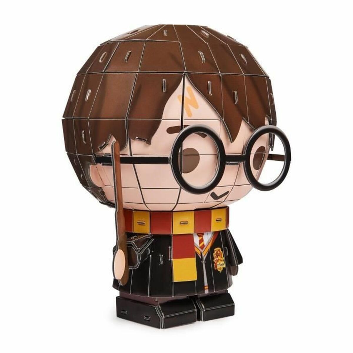 Assembled Harry Potter 3D puzzle displayed on a desk next to a laptop