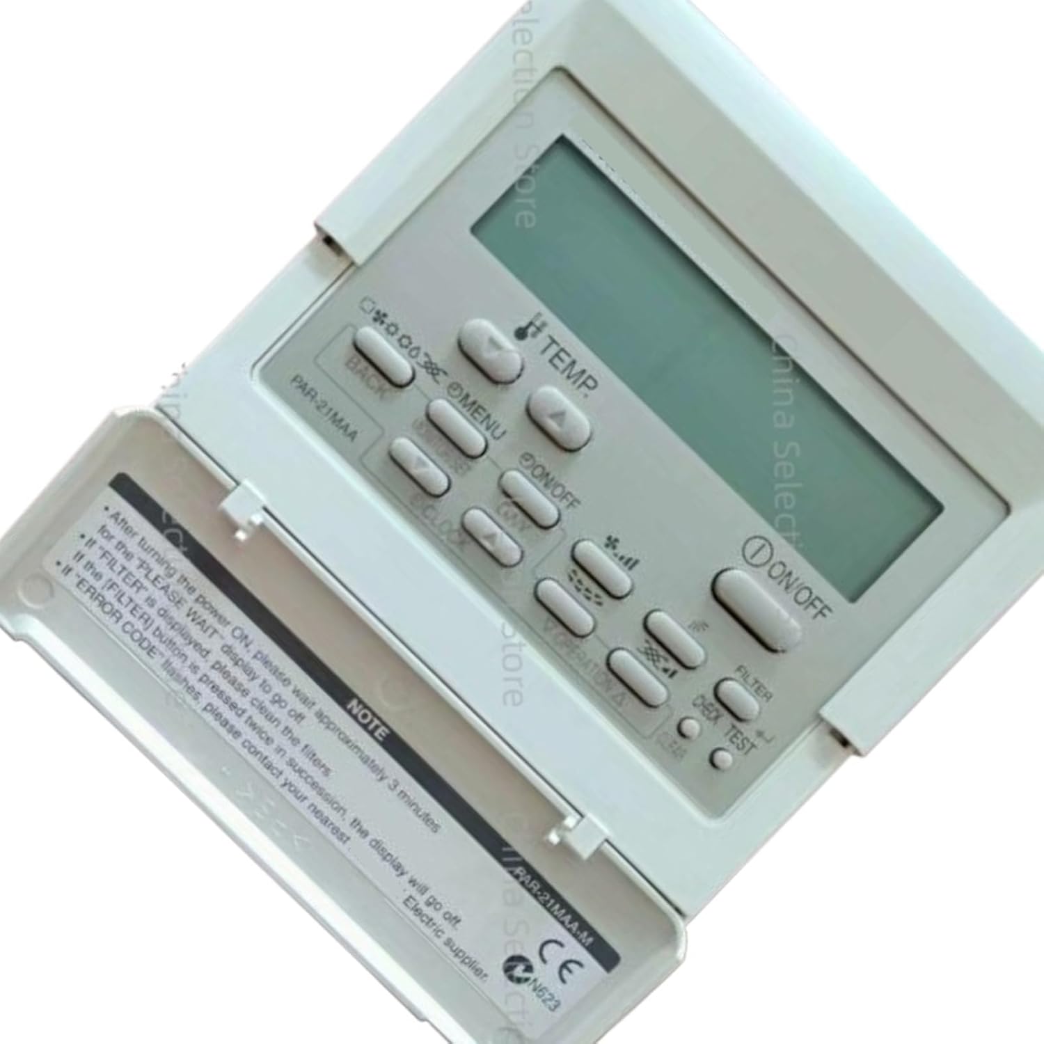 Angled view of the PAR-21MAA wired AC controller, highlighting the 'NOTE' section under the protective cover.