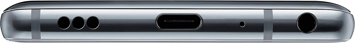 Tlase view of the LG G7 ThinQ showing the speaker grille, USB-C port, microphone, and 3.5mm audio jack.