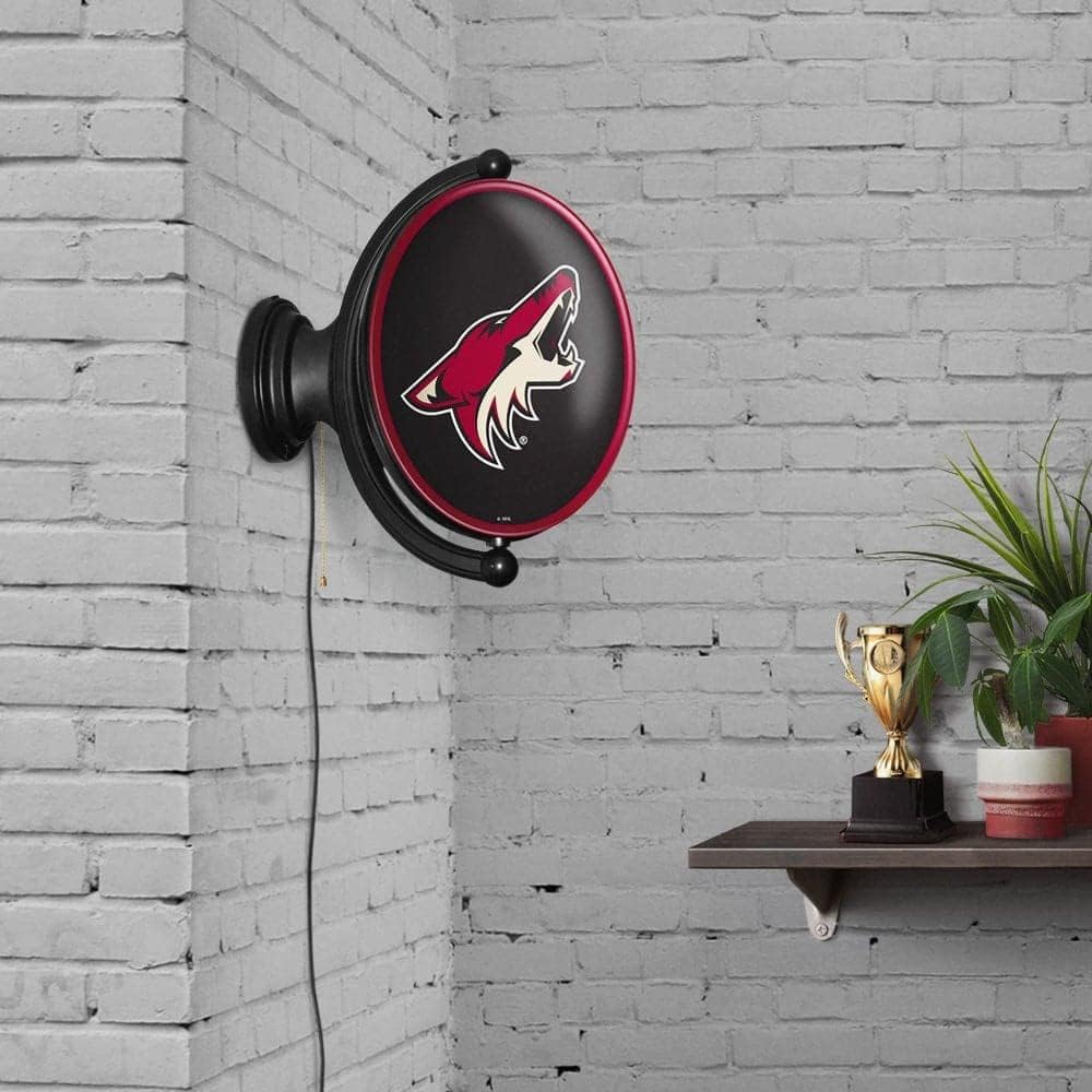 The Fan-Brand Arizona Coyotes Oval Rotating Lighted Wall Sign - Hockey Wall Decor - NHL Decor for Home, Office, Game Room, Fan Cave & Garage - USA Made