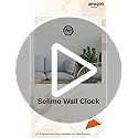 Image of Amazon Brand - Solimo 12-Inch Wall Clock - Designer (Silent Movement, Black Frame), Analog, Plastic