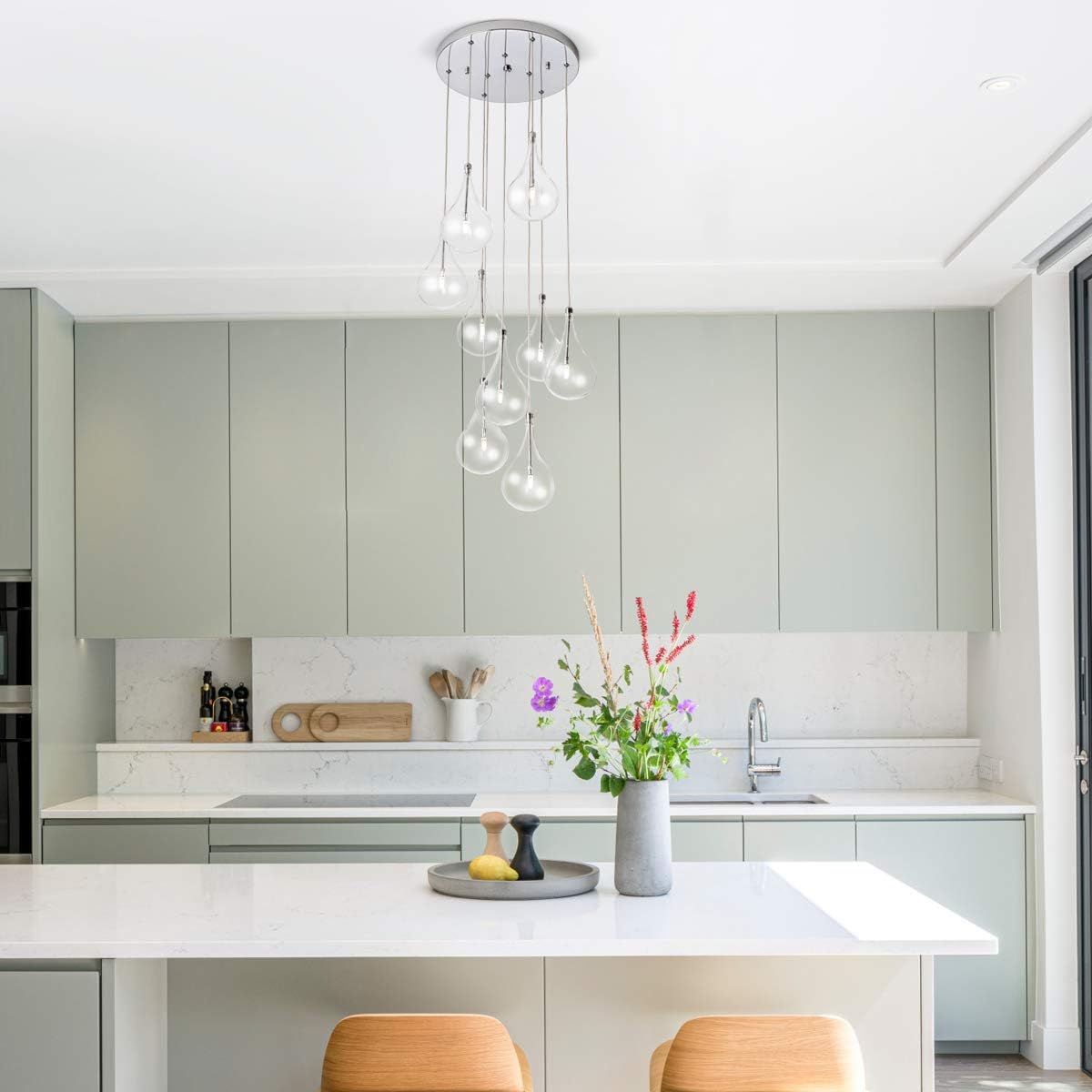 Nеw Arrіvаlѕ Modern LED Chandelier with 9 Clear Raindrop Glass Bulbs, Dimmable Cluster Pendant Lighting for Kitchen Living Room Dining Room Stairwell, G4 LED Bulbs Included