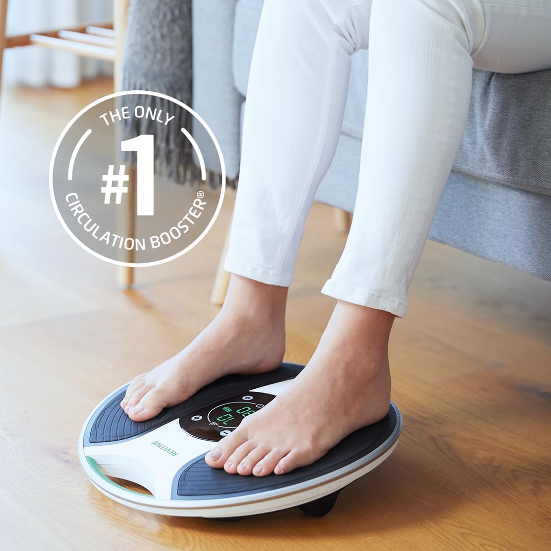 Person's bare feet on the Revitive Medic Knee Circulation Booster