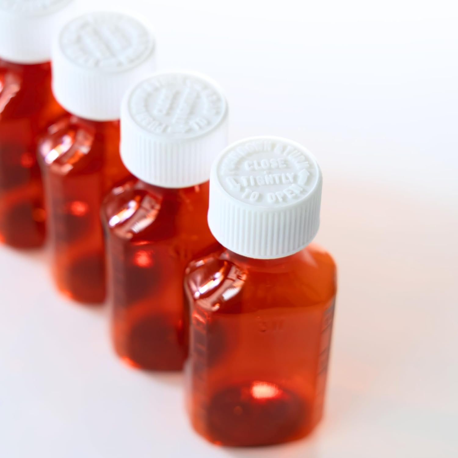 Botellas vacías de plástico ámbar para medicamentos líquidos con tapas resistentes a los niños, caja de 100 botellas dispensadoras ovaladas de medicamentos farmacéuticos con tapas de seguridad,