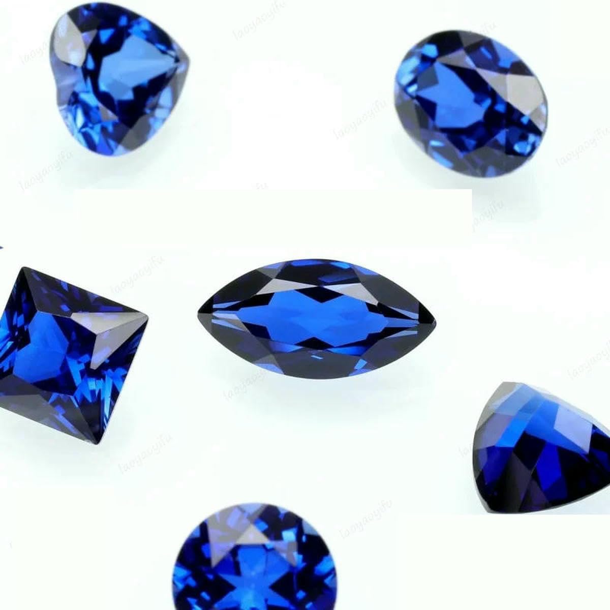 Schmuckanhänger aus königsblauen Edelsteinen in verschiedenen Formen – 13 x 18 mm – ca. 21 ct – mit AGL-Zertifikat