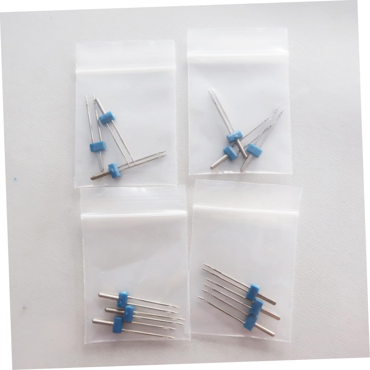 ETHZZLE 100pcs Electric Multi-Function Twin Needle Kit for Sewing Machines Double Needles Household Sewing Accessories Compatible with Knits and Quilting Machines