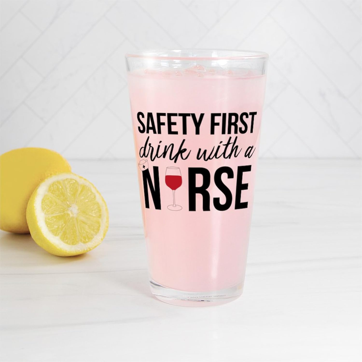 CafePress Safety First Drink With A Nurse Pint Glass, 16 oz. Drinking Glass