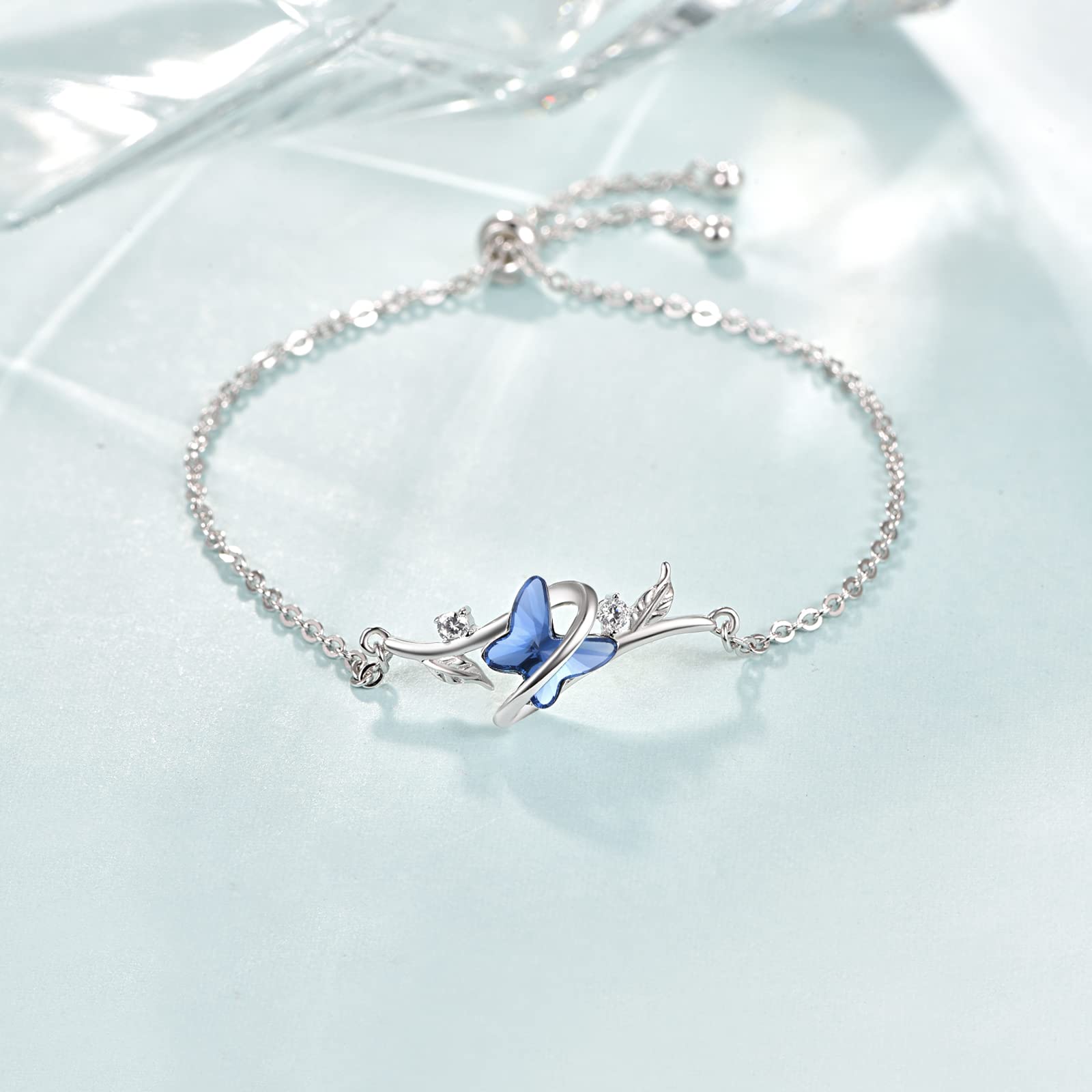 KINGWHYTE Pulsera de mariposa de plata de ley 925 con cristales azules, ajustable, para aniversario, cumpleaños, Navidad, regalo para mujer, 7 inch, Plata de ley