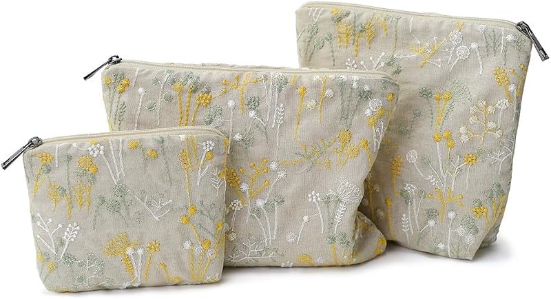 Conjunto com 3 necessaires BBORGDC de algodão com estampa floral bege, tamanhos variados e zíper