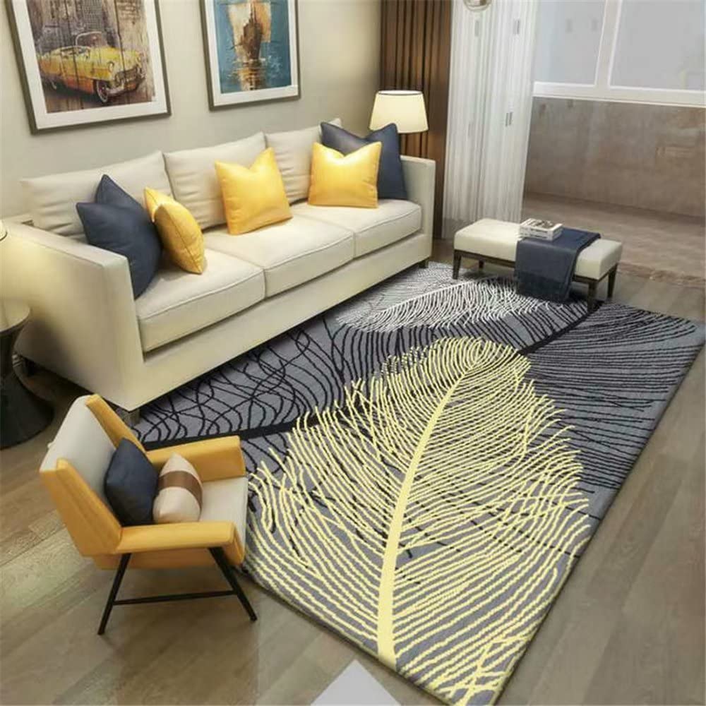 Tapis durable lavable jaune à motif grandes plumes 60x90cm