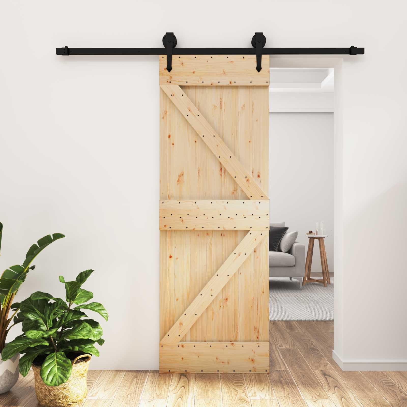 Nowoczesne drzwi przesuwne 70 x 210 cm z litego drewna sosnowego z naturalnym wykończeniem i czarnymi malowanymi proszkowo elementami stalowymi, oszczędzający miejsce mechanizm wychylny u góry