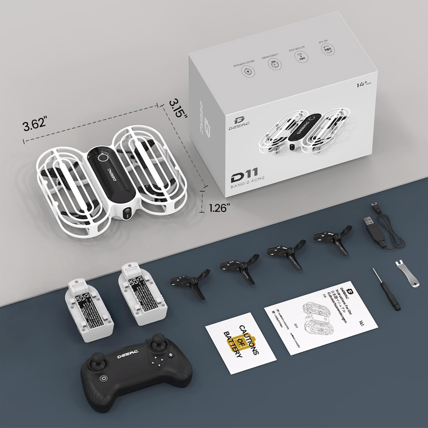 Contents of the DEERC D11 drone box including drone, remote, batteries, and tools