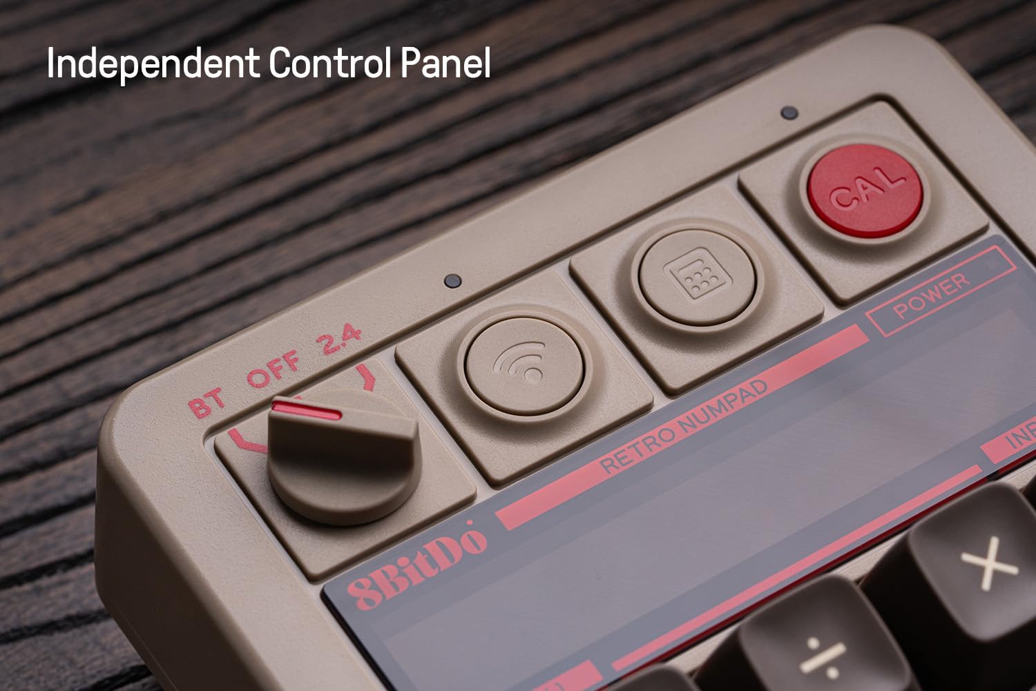 Close-up of the 8Bitdo Numpad's independent control panel