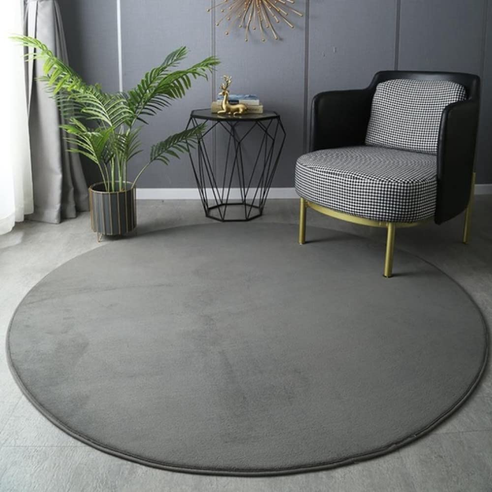 Tapis rond en velours corail pour coin lecture cosy de salon