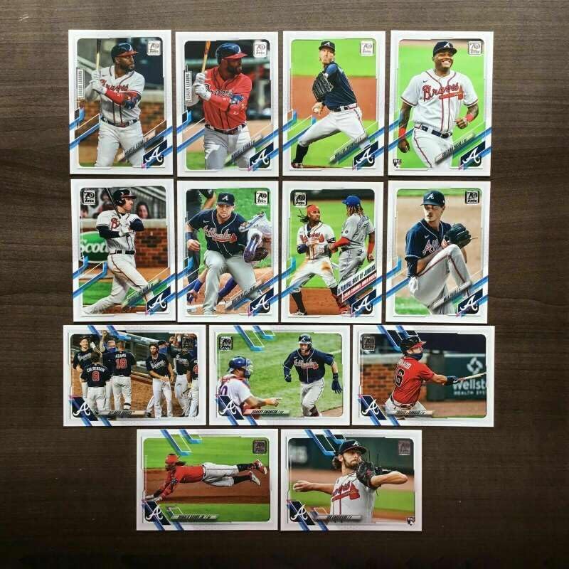 2021 Topps Series 1 Baseball Atlanta Braves Base MLB Hand Collated Team Set in Near Mint to Mint Condition of 13 Cards: 9 Max Fried - 61Vladimir Guerrero Jr. / Ronald Acuna Jr. - 101 Travis dâ€™Arnaud - 111 Austin Riley - 120 Freddie Freeman - 187 Cristian Pache RC 194 Atlanta Braves Team Card - 209 Mike Foltynewicz - 220 Marcell Ozuna League Leaders - 233 Dansby Swanson - 239 Ian Anderson RC 263 Ronald Acuña Jr. - 312 Marcell Ozuna League Leaders
