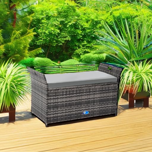 Open storage bench with pneumatic support system and various items inside
