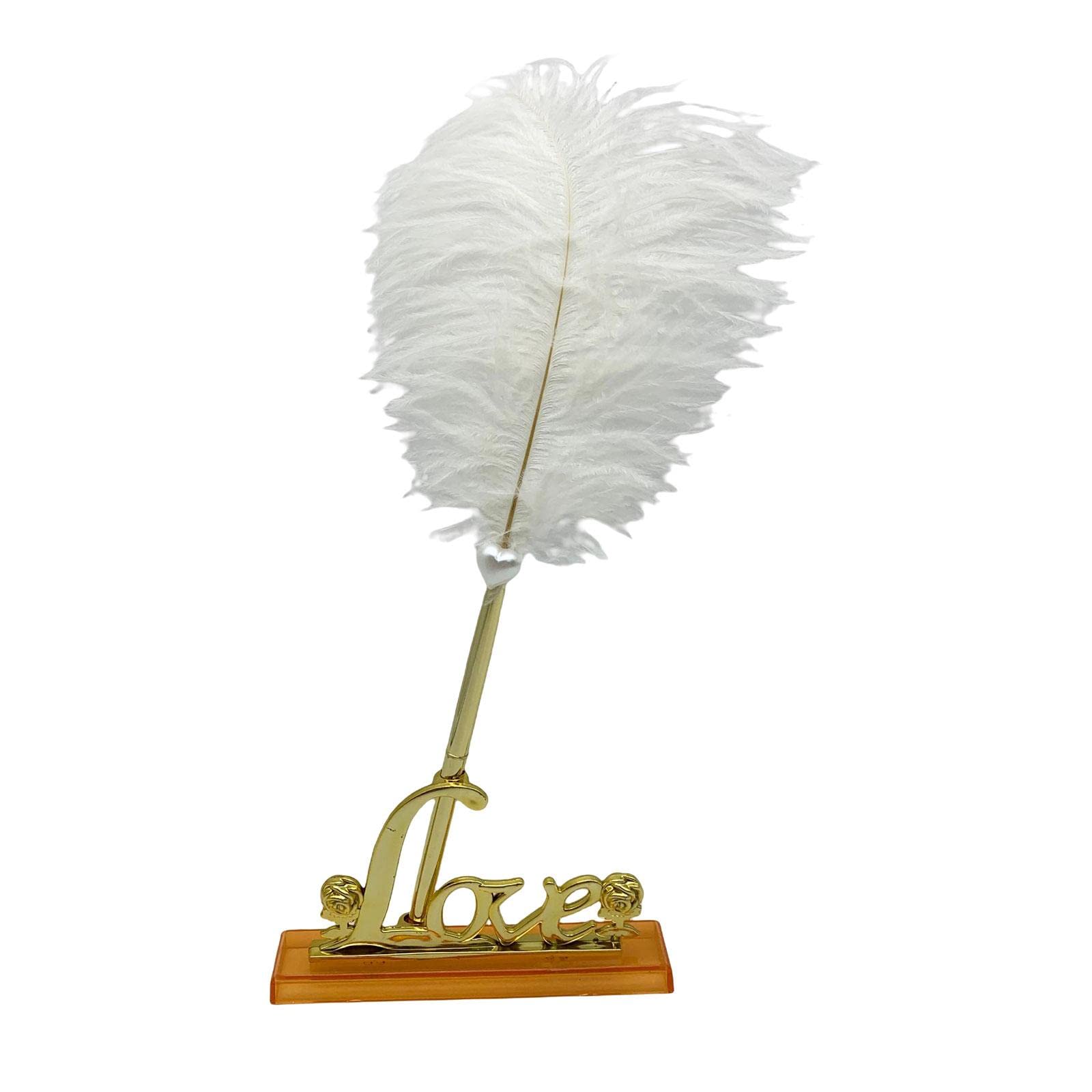 Stylo à bille plume blanc avec support pour éviter les taches d'encre sur le bureau