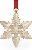 Vista 6 de Swarovski Edición anual 2023 Adorno de estrella pequeña con cinta verde y detalles acabados en tono dorado, parte de la colección Swarovski Annual