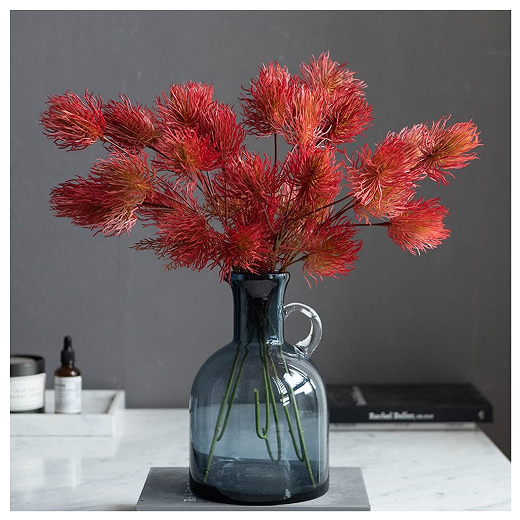 Fleurs artificielles de rambutan pour décorer une table basse de salon