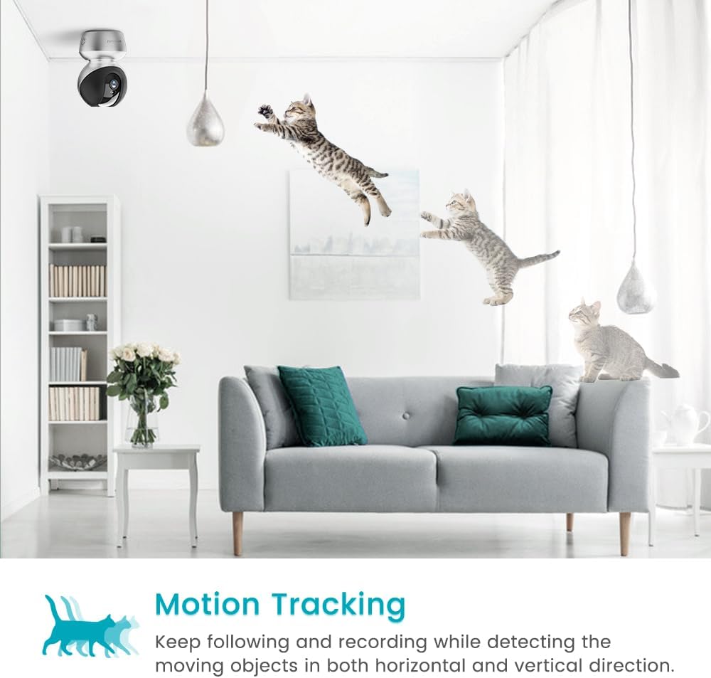 A VIMTAG camera mounted on the ceiling, tracking multiple cats jumping and playing in a living room, illustrating motion tracking.