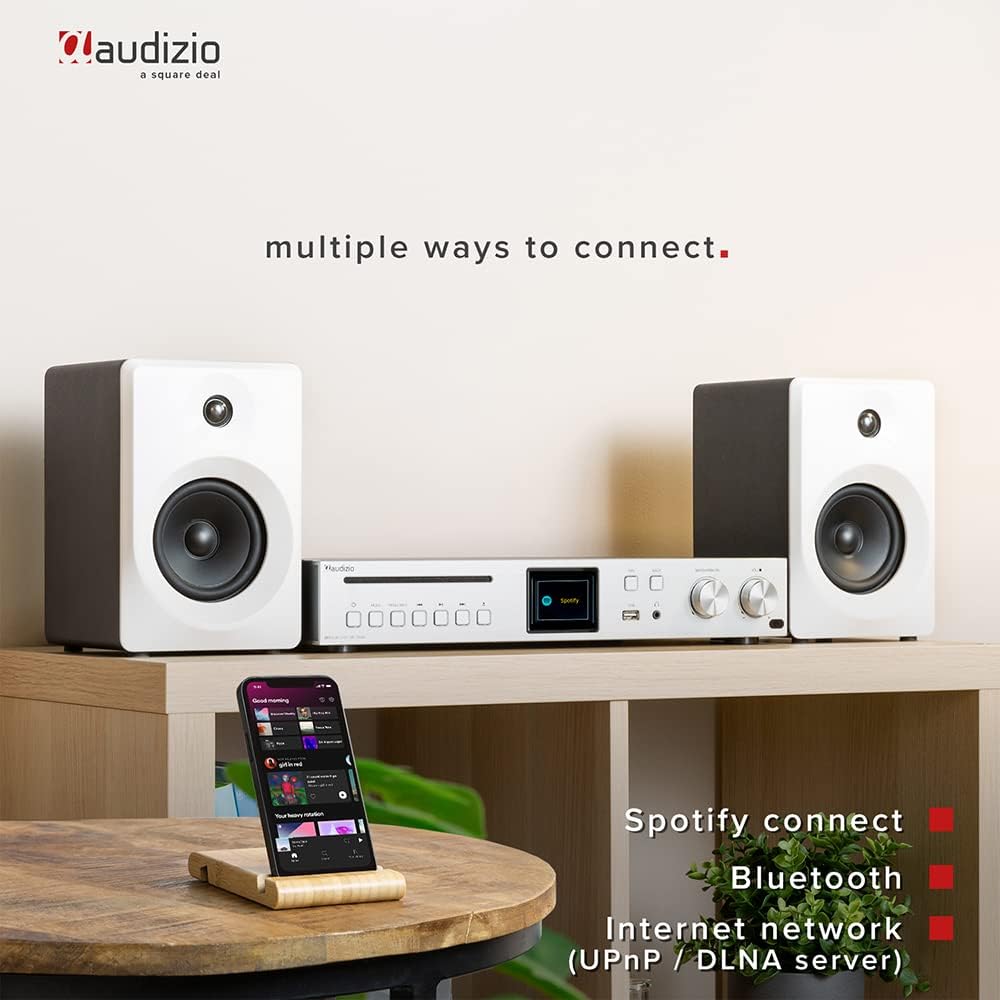 Audizio Brescia amplifier connected to speakers and a smartphone via Bluetooth, illustrating multiple connection options.