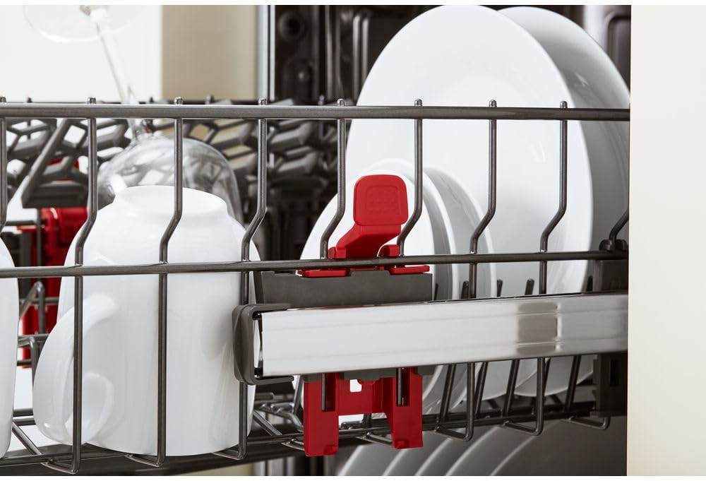 Upper rack of Whirlpool WSIC 3M17 C dishwasher with adjustable elements and cups.