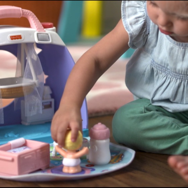 little people cuddle and play nursery