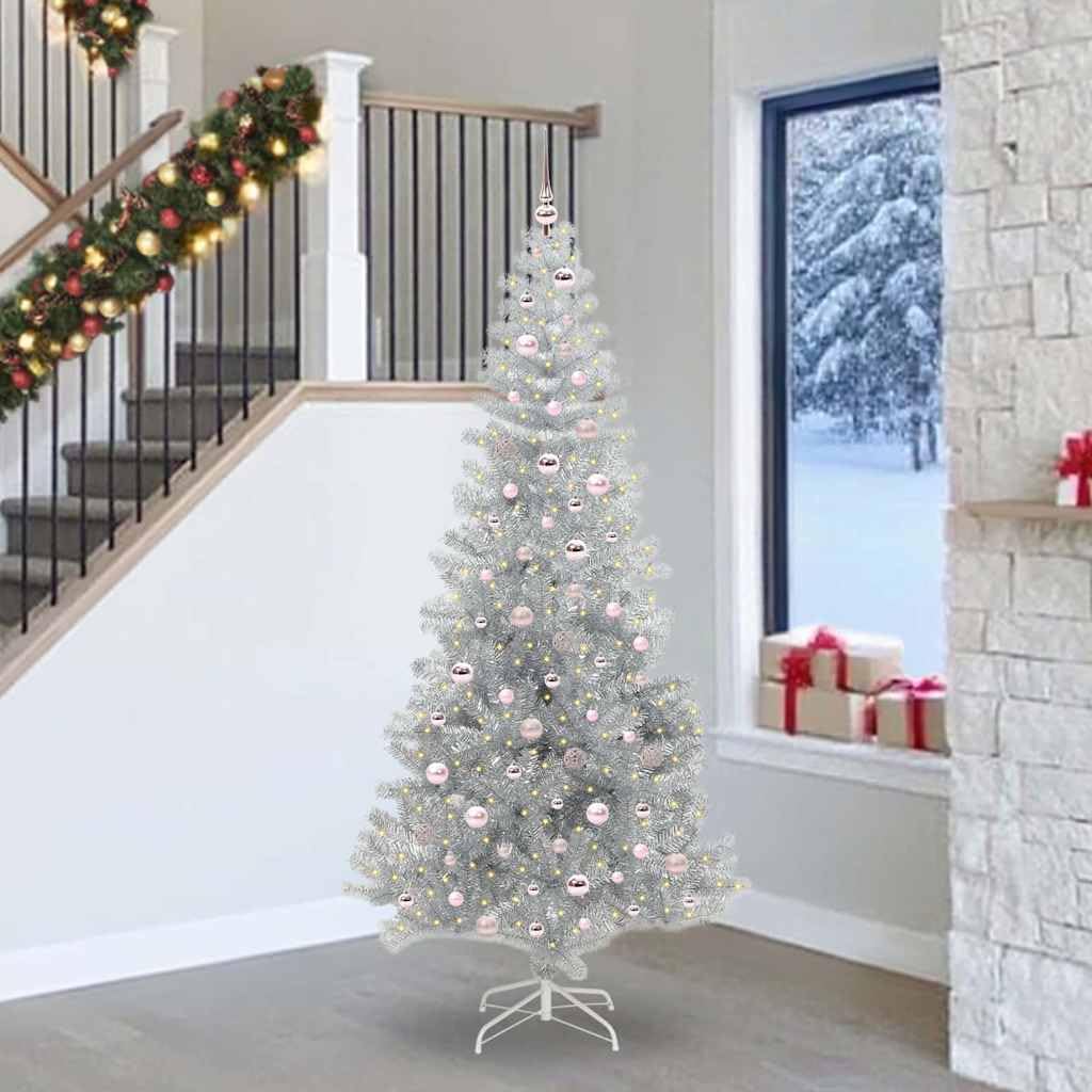 Sapin de Noël artificiel argenté idéal pour illuminer le salon