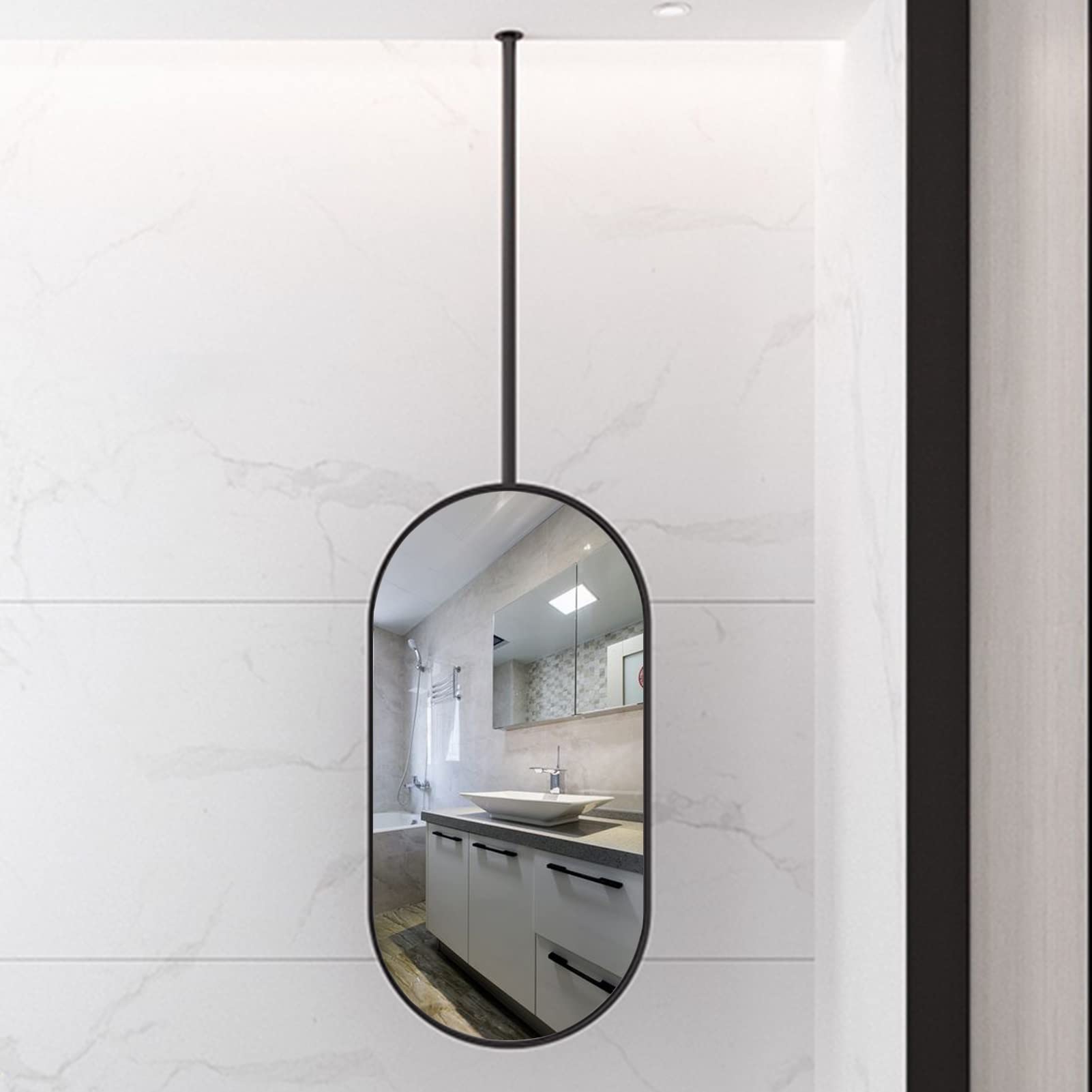 Miroir ovale cadre métal noir 40x60cm pour agrandir une entrée sombre