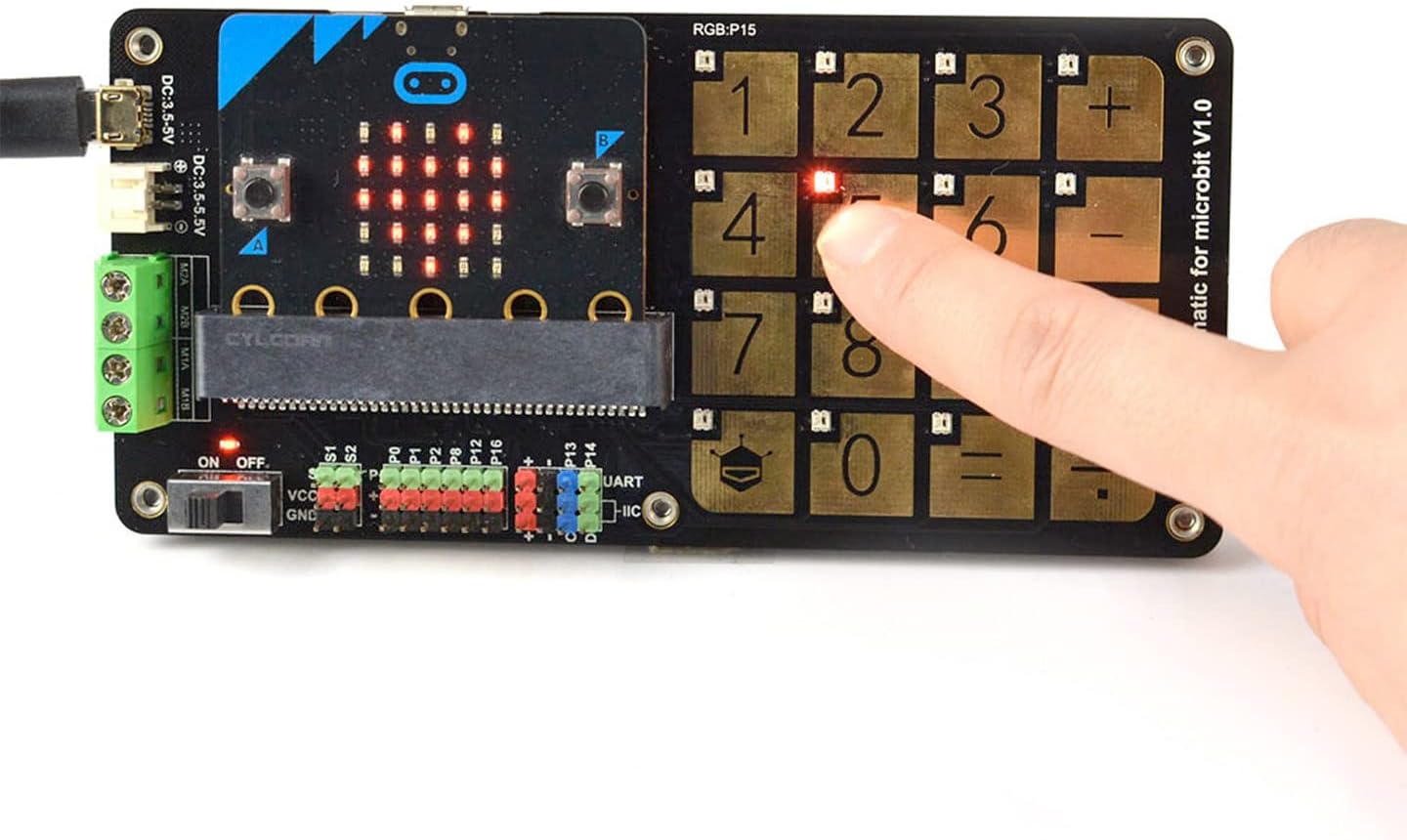 Angled view of the micro:Touch Keyboard with a battery holder detached.