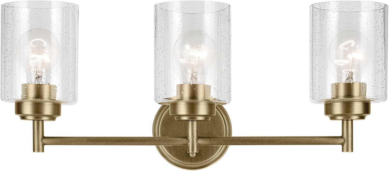 Kichler Winslow 21.5" 3-Light Bathroom Vanity Light Fixture with Clear Seeded Glass in Natural Brass for Luxe Industrial Style Over Mirror (21.5" x 9.25"), 45886NBR