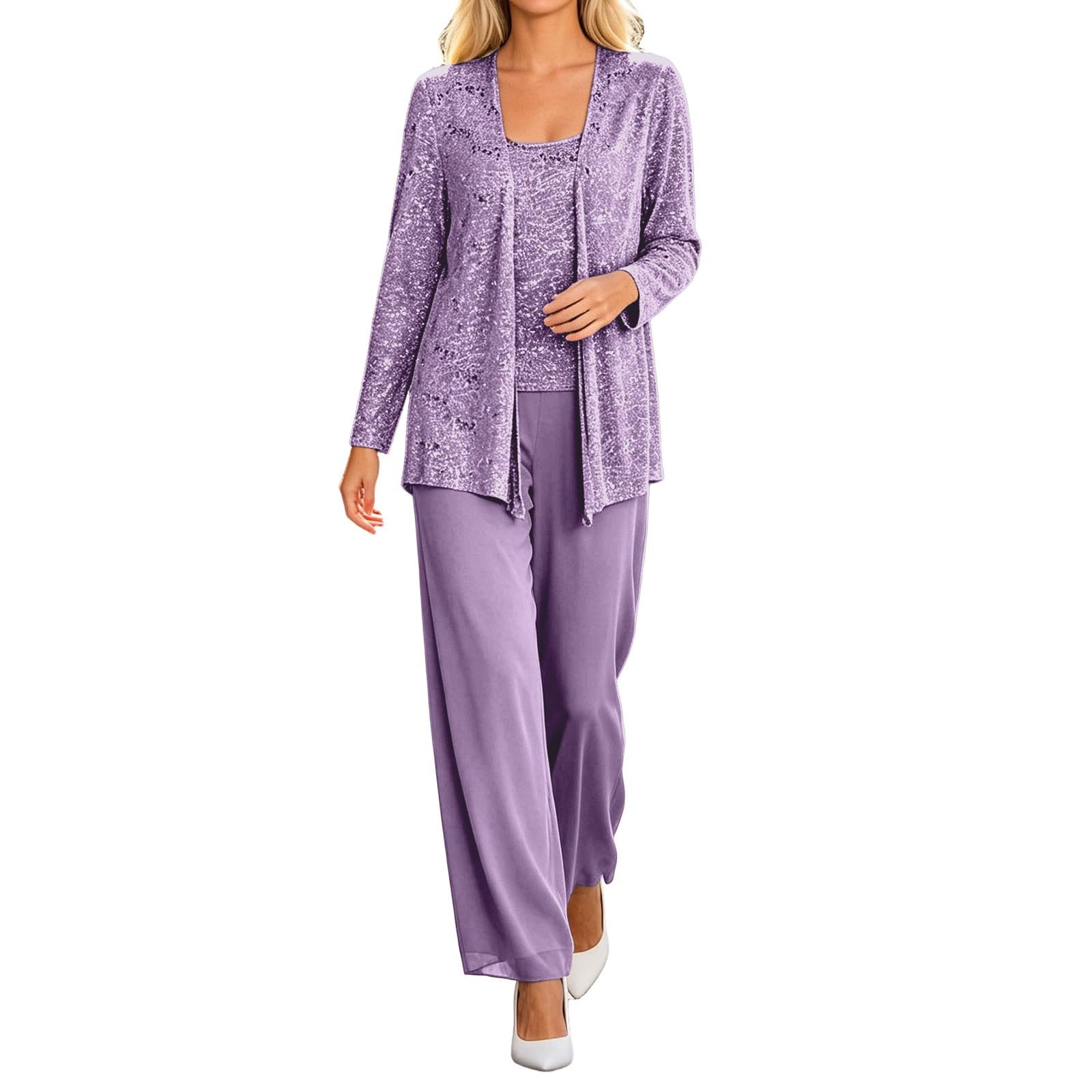 Completo elegante a tre pezzi composto da cardigan in pizzo e pantaloni.