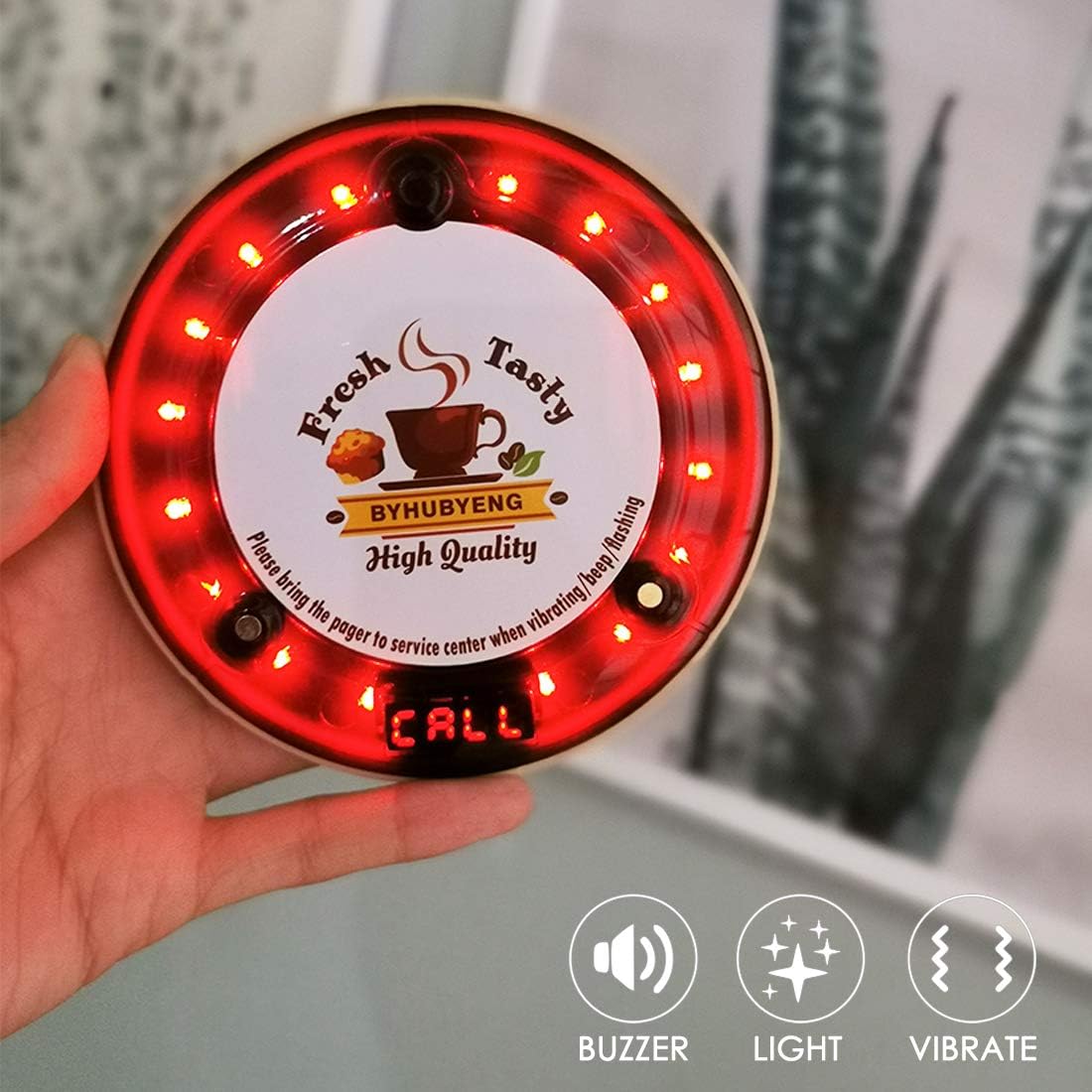 Close-up of a pager showing the buzzer, light, and vibrate prompt modes