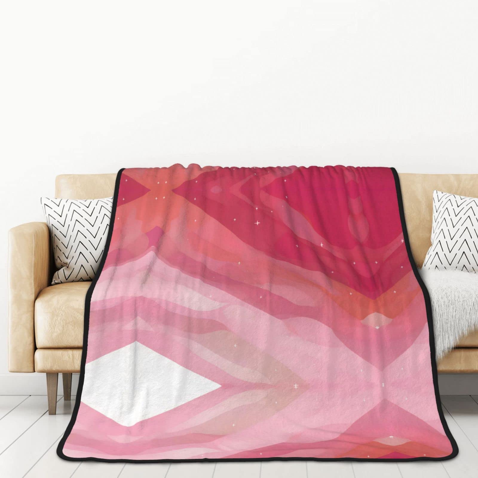 Couverture flanelle rose dégradé pour des moments cocooning au lit