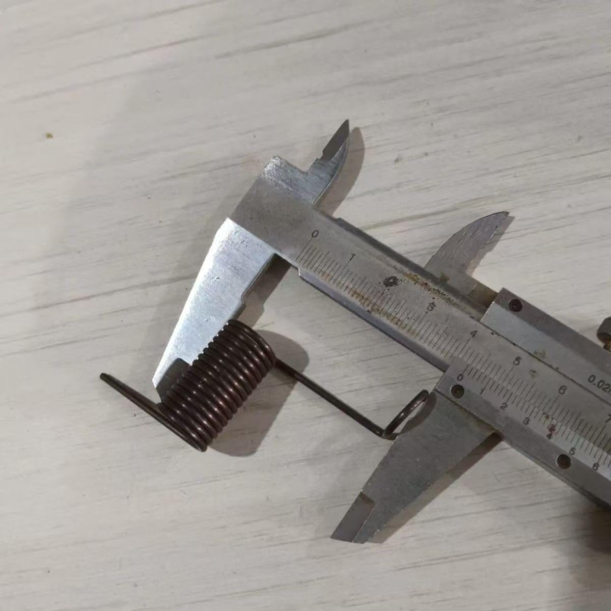 Molle di compressione, Molla della seminatrice a becco d'anatra